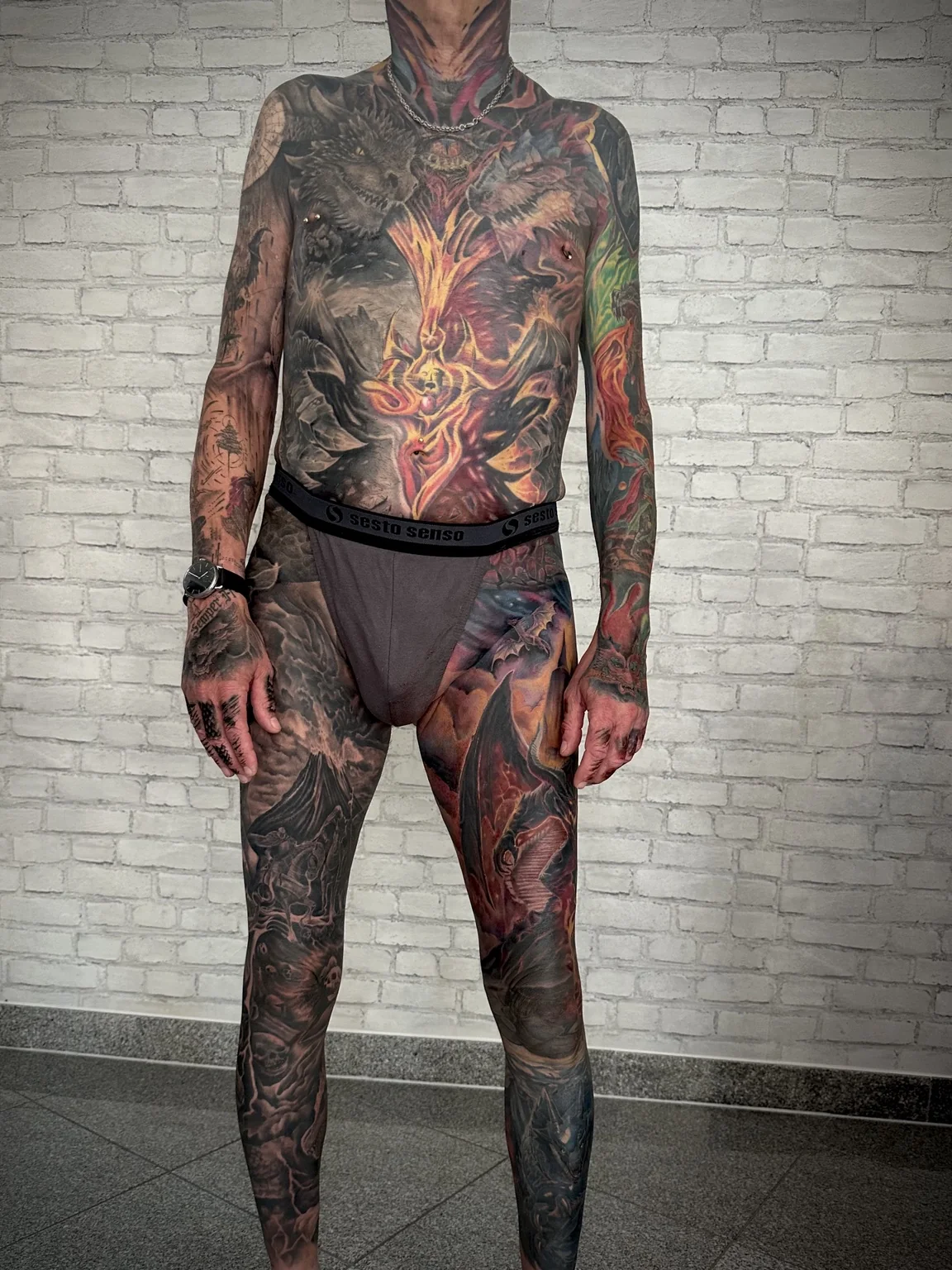 Front view of a full-body fantasy color realism tattoo project by Henry D. Flores