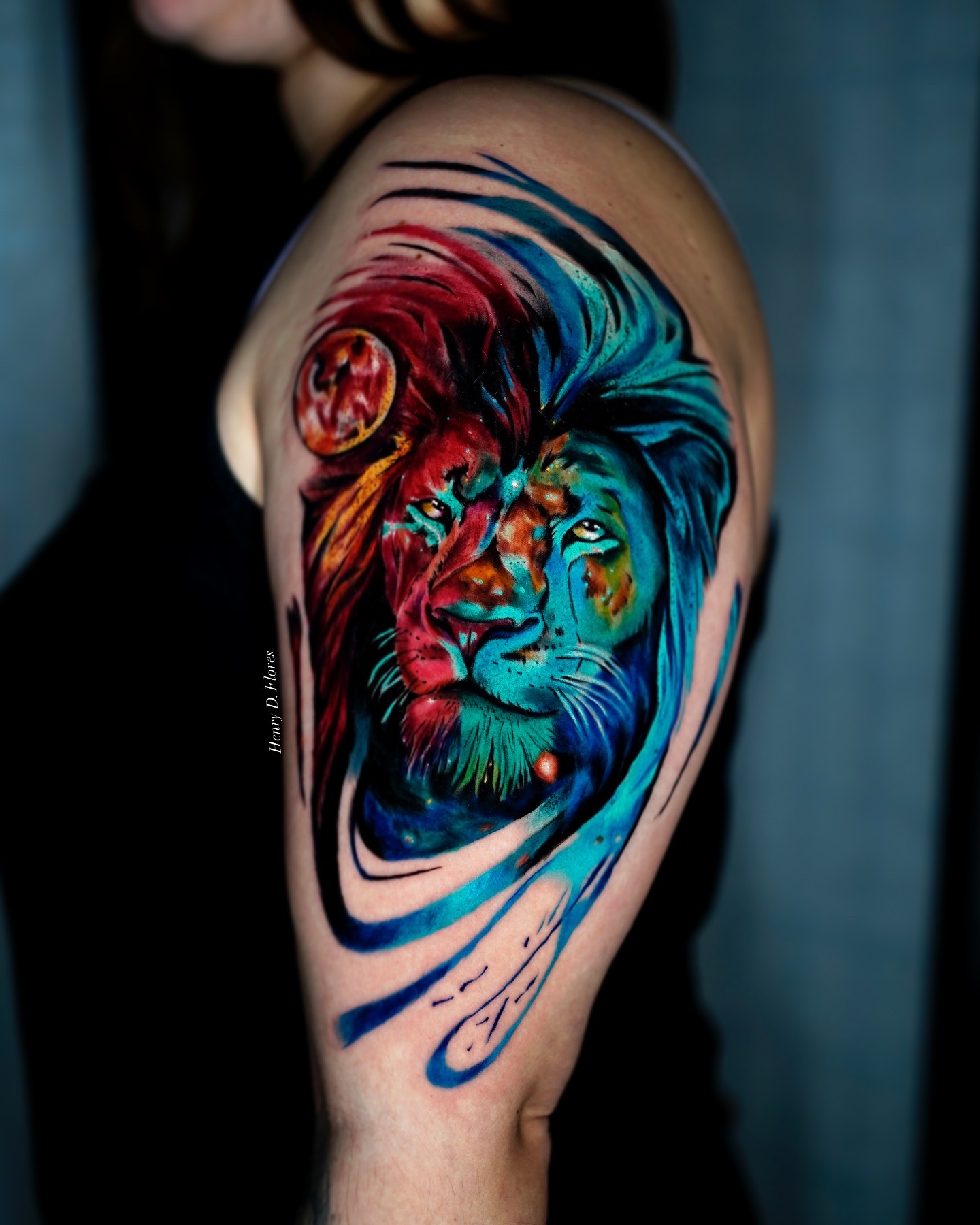 Lion watercolor color realism arm tattoo by Henry D. Flores