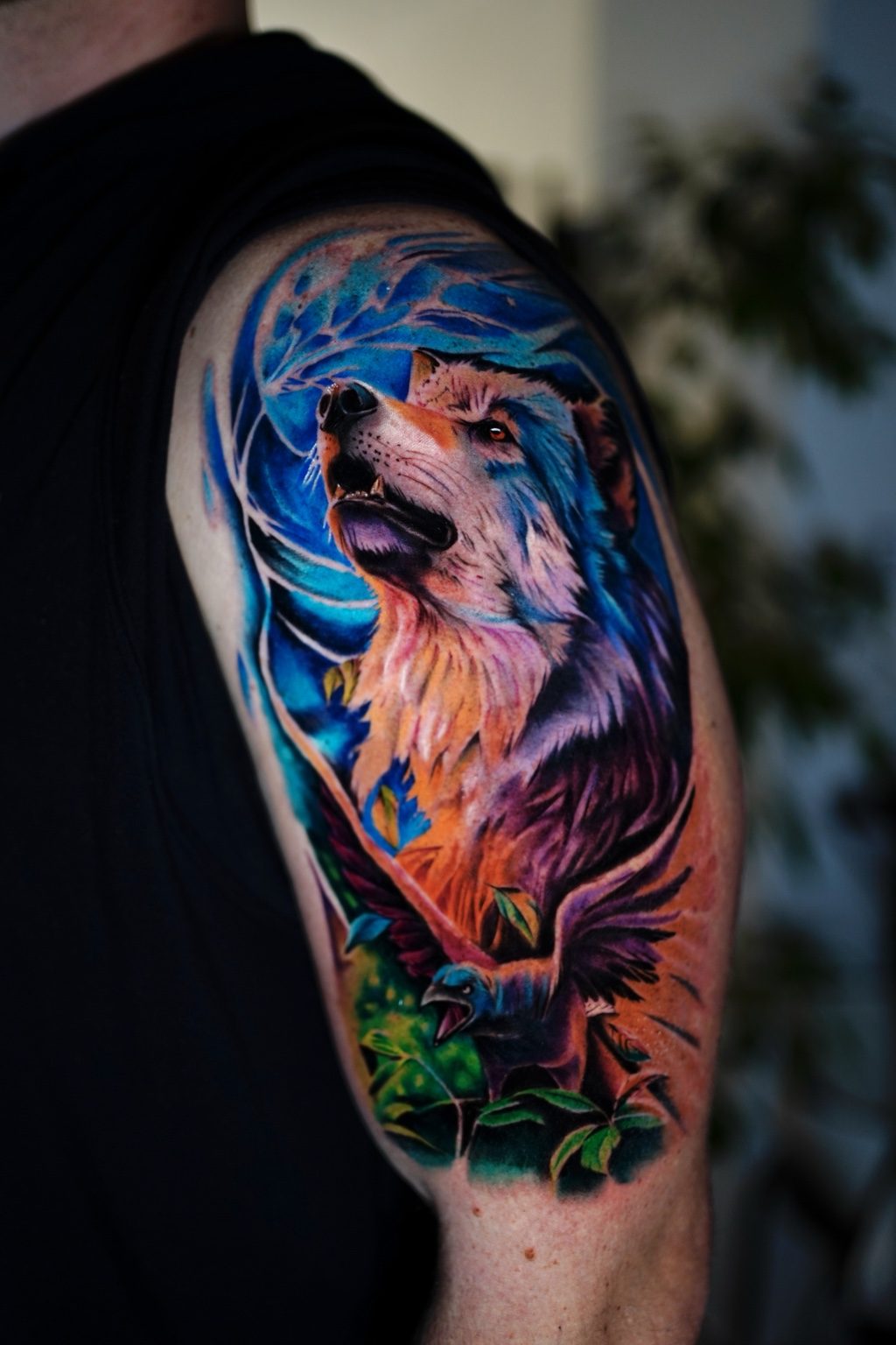Phoenix color realism upper arm tattoo by Henry D. Flores